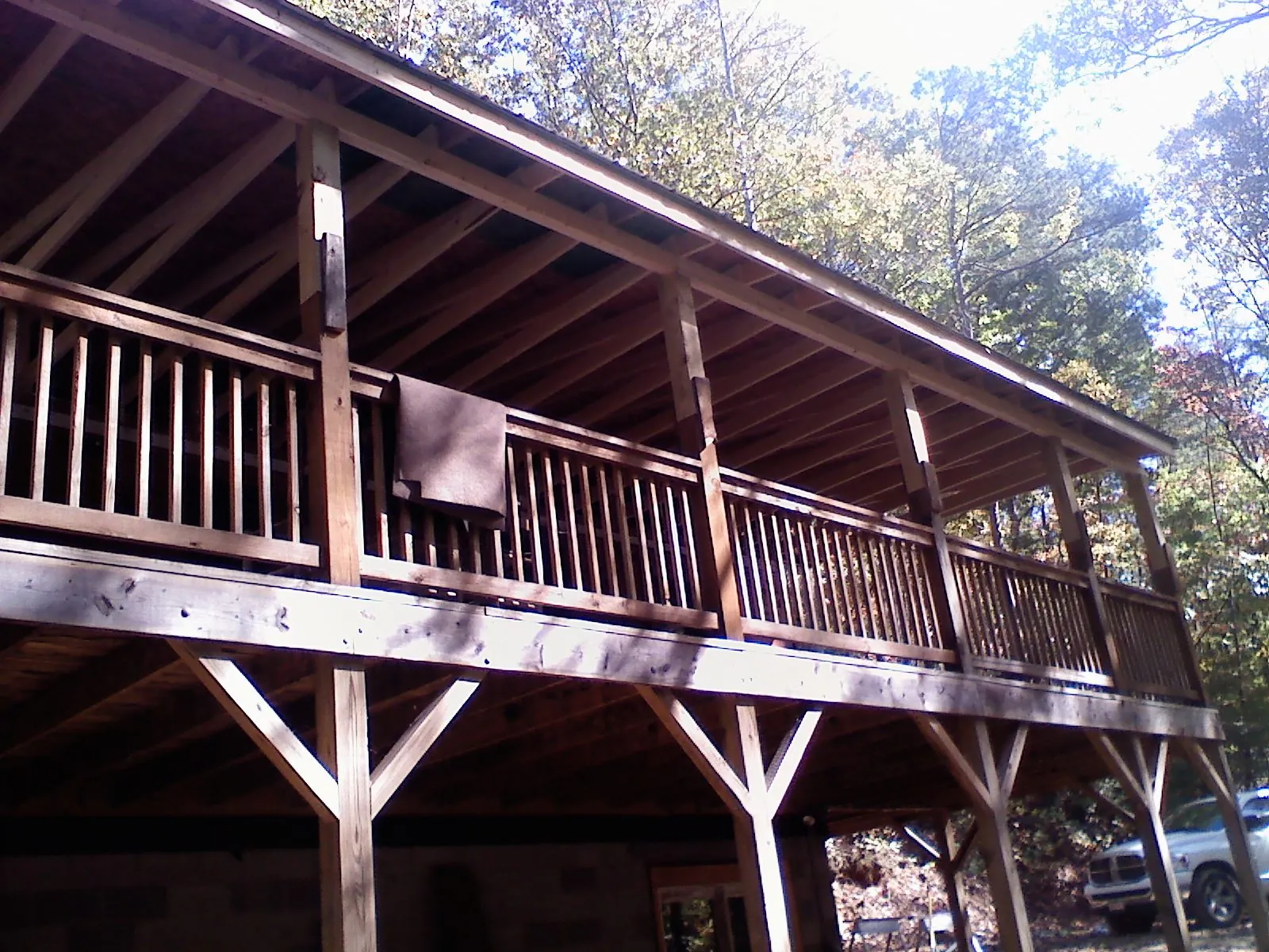 Timber framing under a new elevated porch and deck — Roof Leak Repair in Newtonville by Roofing Brothers